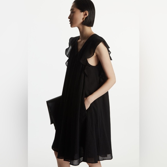 COS Dresses & Skirts - COS Ruffled Cap-Sleeve Dress in Black